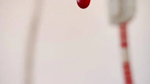 Drops of blood fall down. Allegory of flowing blood. Stock Footage 130486364