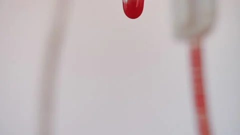 Drops of blood fall down. Allegory of flowing blood. Stock Footage 130486474