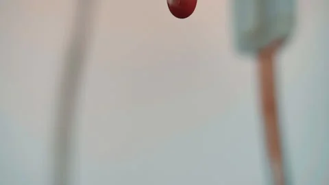 Drops of blood fall down. Allegory of flowing blood. Stock Footage 130486795
