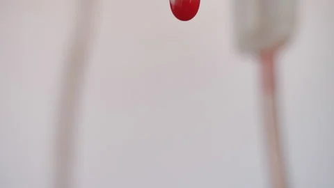 Drops of blood fall down. Allegory of flowing blood. Stock Footage 130486997