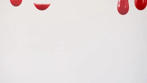 Drops of blood fall down. Allegory of flowing blood. Stock Footage 130489724