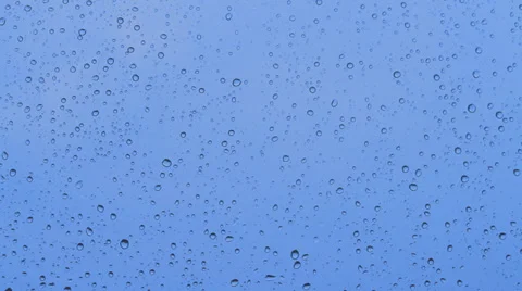Drops on the blue glass Stock Footage 30296973