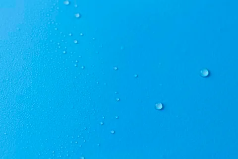 Drops on blue Stock Photos