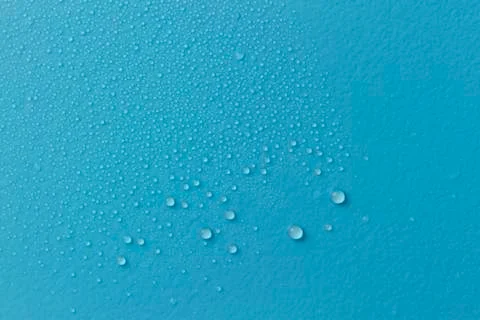 Drops on blue Stock Photos