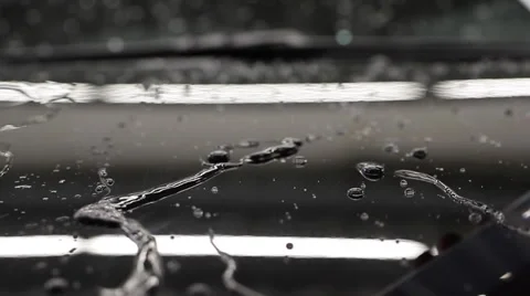 Drops on the car hood Stock Footage