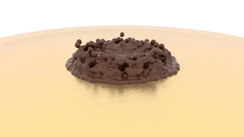 Drops of chocolate spread over the surface. Hot chocolate or cocoa splashes. Stock Footage 119925010