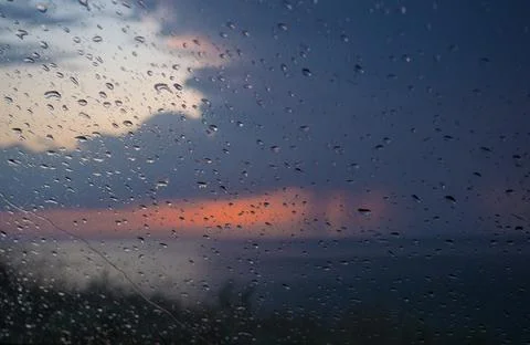 Drops of clean water on the surface of a car window Stock Photos