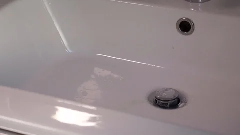 Drops of colored soap on a white background Stock Footage 124631318