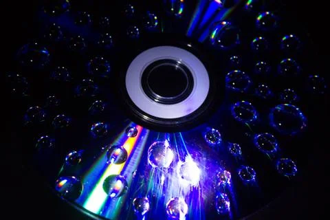 Drops on the computer disk Stock Photos