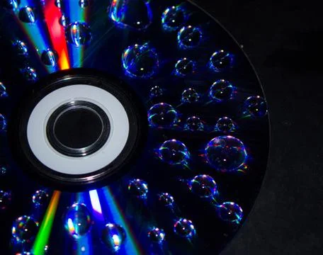 Drops on the computer disk Stockfoto's