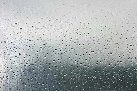 Drops of dew on a transparent surface Water droplets on a transparent surf... 스톡 사진