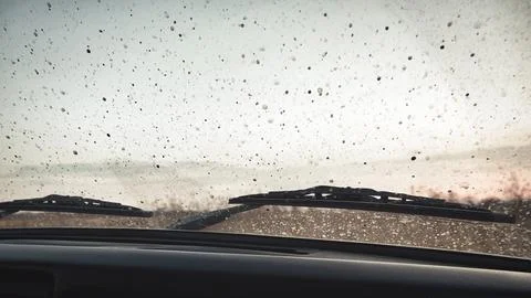 Drops of dirt on the windshield of a car Stock Photos