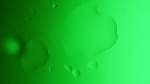 Drops drip from above and scatter across a green gradient background Vídeo Stock 303060859