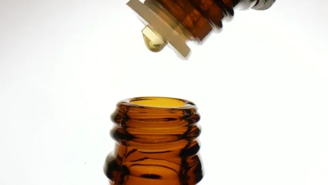 Drops of essential oils in bottles  Video stock 267189032