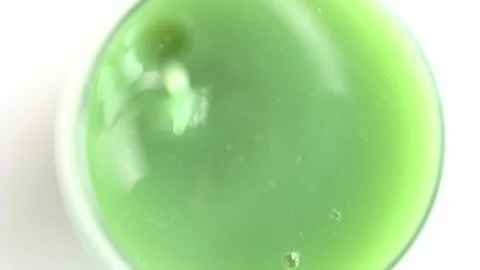 Drops fall into a glass of smoothie Stock Footage 272439701