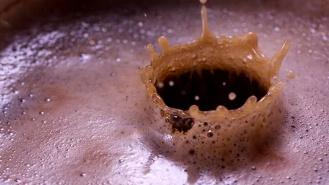 Drops Falling In A Cup Of Coffee In Super Slow-motion 1000fps Stock Footage 130958772