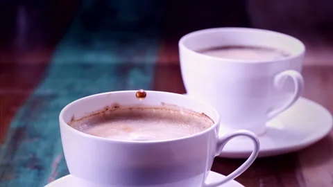 Drops Falling In A Cup Of Coffee In Super Slow-motion 1000fps Stock Footage 130958914