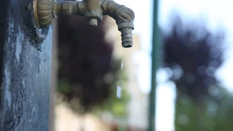 Drops falling slowly from the faucet Stock Footage 159048810