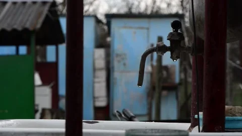 Drops falling from vintage tap Stock Footage 152788999