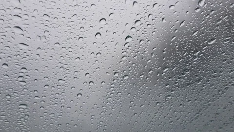 Drops flow through the misted glass Stock Footage 83677228