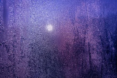 Drops flowing down the glass Stock Photos