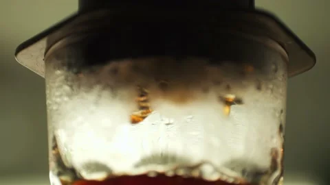 Drops of fresh coffee pass through the filter and drip into the misted glass 스톡 동영상 237804509