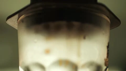 Drops of fresh coffee pass through the filter and drip into the misted glass 스톡 동영상 237918320