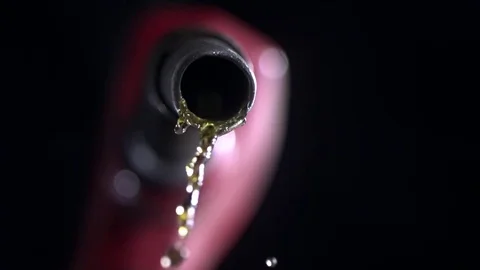 Drops of fuel dripping from the nozzle in slow motion Stock Footage 81226258