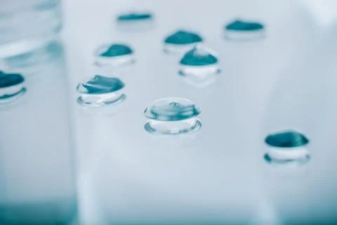 Drops of gel on a mirror surface. Photos