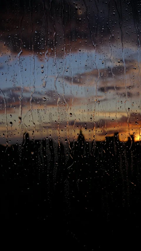 Drops on the glass. evening sunset. sky, urban Stock Footage 282988434