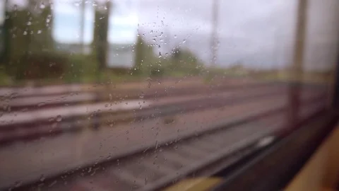 Drops on the glass. The train is going. Stock Footage 130009095