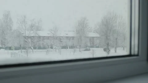 Drops on the glass of the window of the house, the view from the window on the Stock Footage 165588700