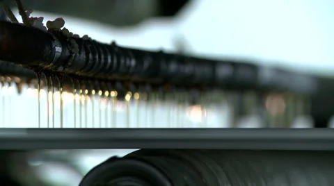 Drops of glue drips at panel moves on roller Stock Footage 57809901