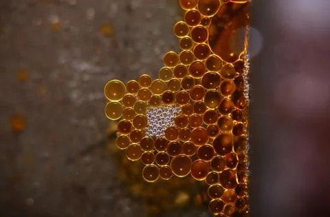 Drops of grease in a regular pattern Stock Photos