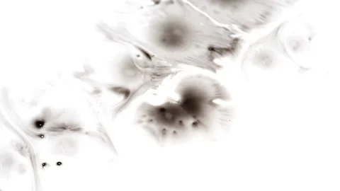 Drops of ink blot spreading slowly on whole screen Stock Footage 147702866