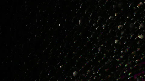Drops On An Iridescent Surface Stock Footage 170476576