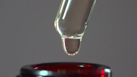 Drops of liquid being pumped Stock Footage 189981099