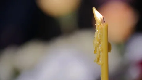 Drops of melten wax falling from a candle slow motion Stock Footage 84306102