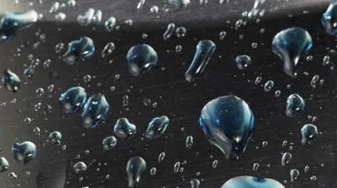 Drops on a metal surface. 스톡 동영상 37017094