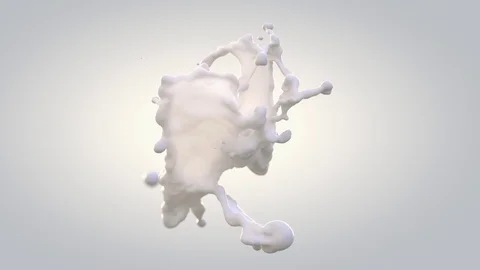 Drops of milk colliding in slow motion forming beautiful detailed splash Stock Footage 88476193