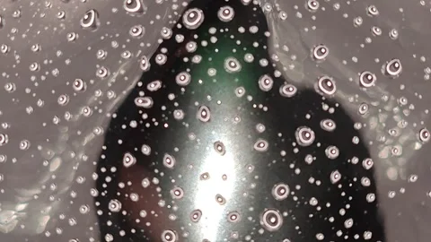 Drops moving in a circle are mesmerizing close-up 動画素材 325050842