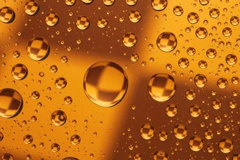 Drops over a chess board Stock Photos