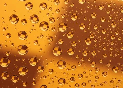 Drops over a chess board Stock Photos