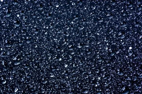 Drops pattern on wet background background glass. Drops form seamless liquid Stock Photos