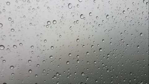 Drops of rain appearing  in the glass Stock Footage 104550125