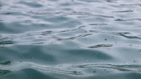 Drops of rain fall on the expanse of the sea. Stock Footage 118576936