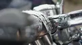 Drops of rain falling down on motorcycle handlebars, transport trade show HD Footage