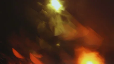 Drops of rain flow down the glass against the bokeh background of moving cars Stock Footage 107652594