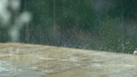 Drops of rain on garden table Stock Footage 94303370