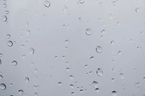 Drops of rain on glass Stock Photos